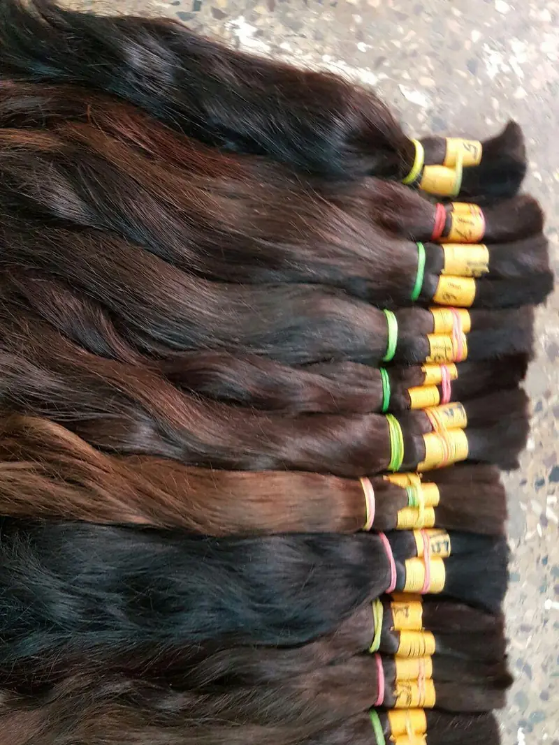 Brown and black bulk hair bundles, tied and lotted