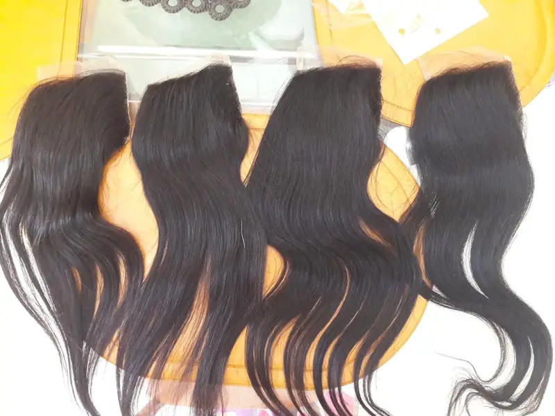 Four lace closures laid out