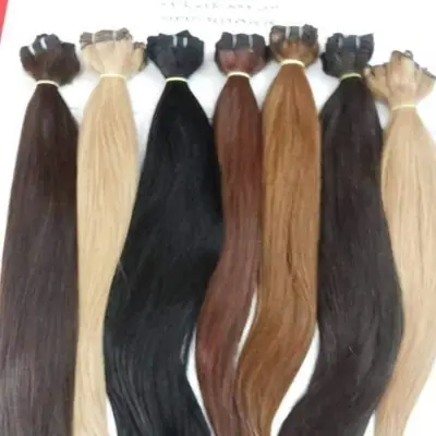 Straight bulk hair bundles in black, brown and blonde, laid side by side